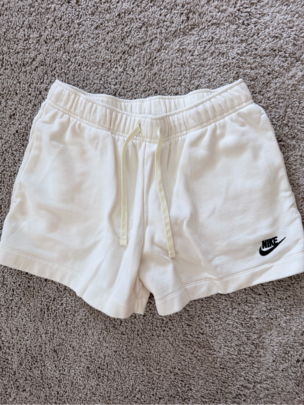 Nike Women's Cream Drawstring Athletic Shorts with Black Swoosh